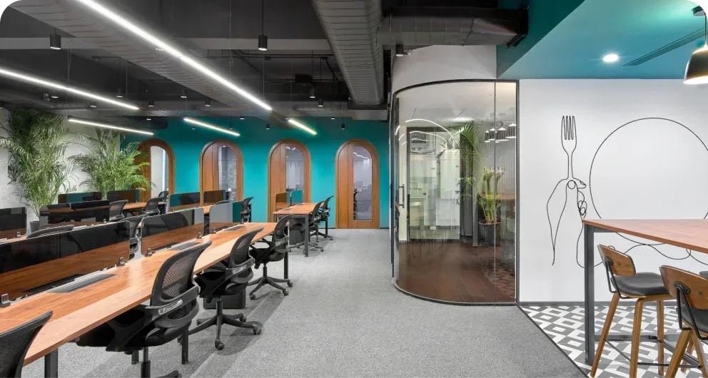 work@100FEET coworking floor: teal arches and walnut workstations